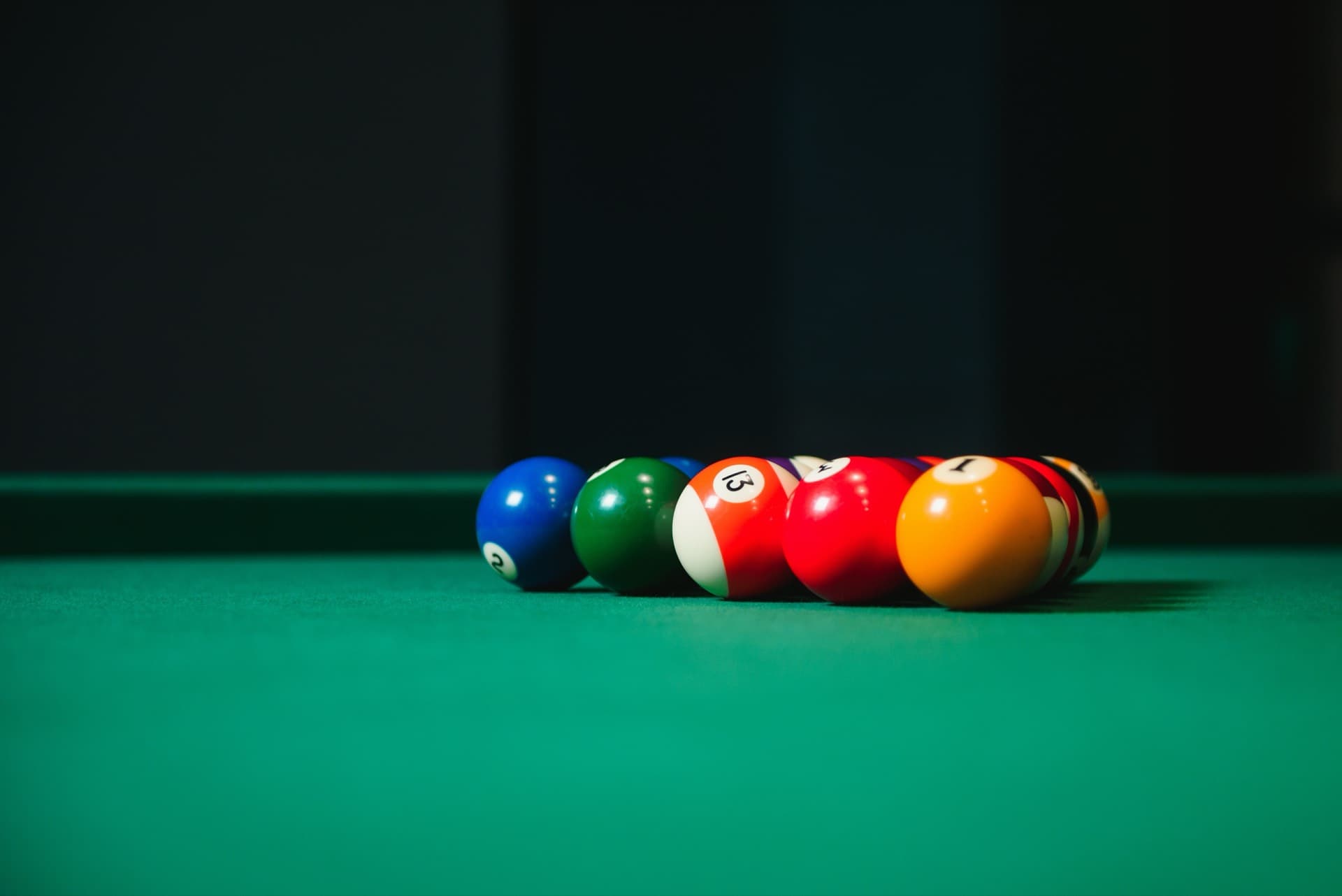 Billiard balls on green felt