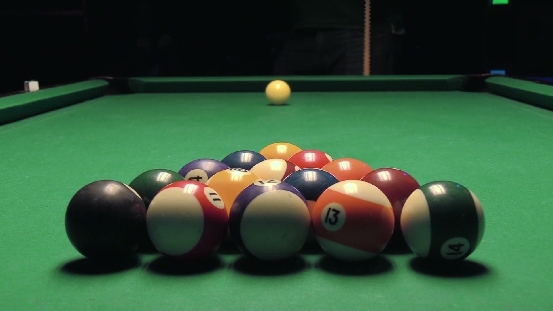 Pool game at Gold Crown Billiards